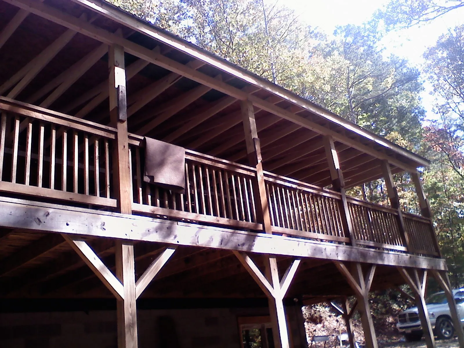 Timber framing under a new elevated porch and deck — Roof Leak Repair in Dedham by Roofing Brothers